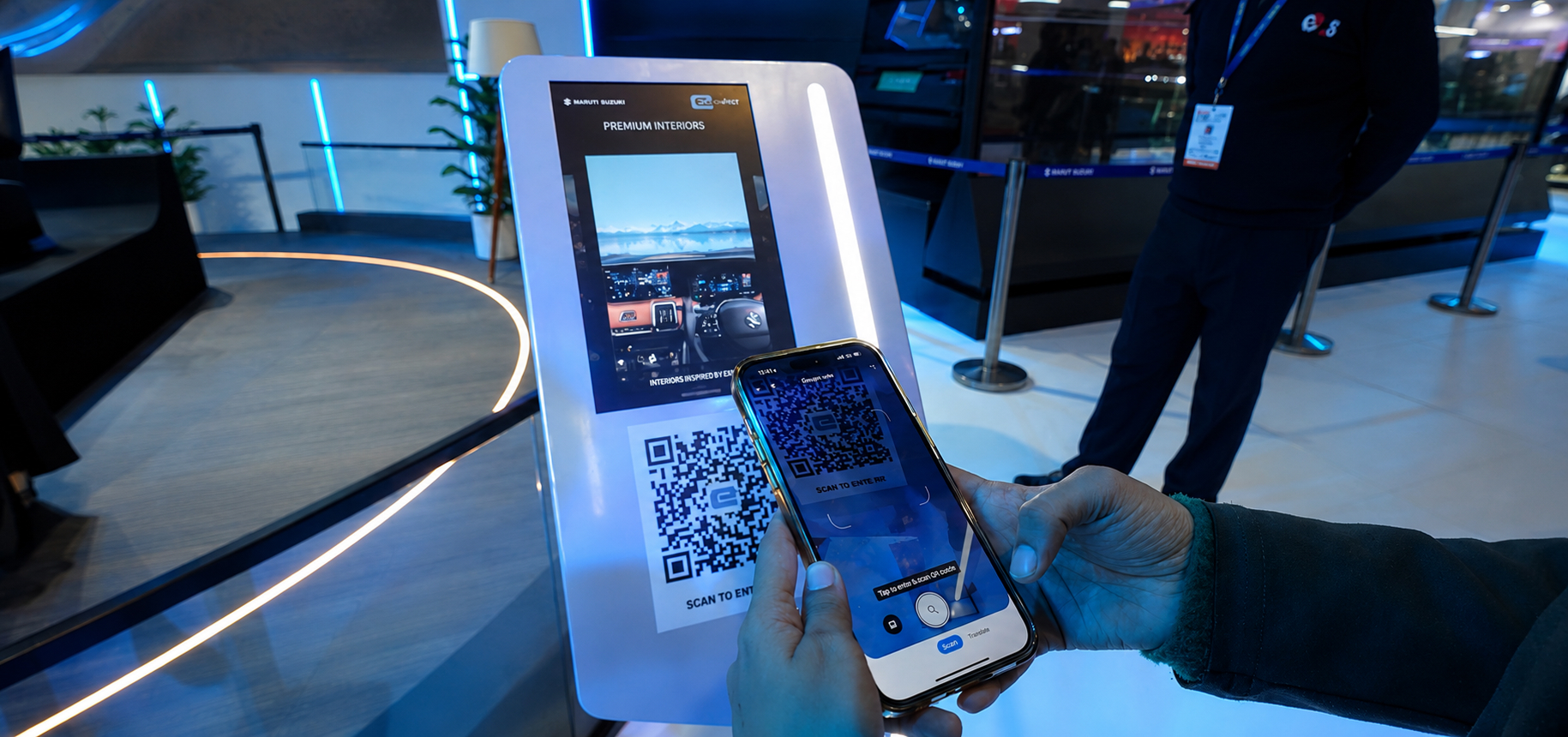 scanning QR code on kiosk to explore Maruti Suzuki interactive experience